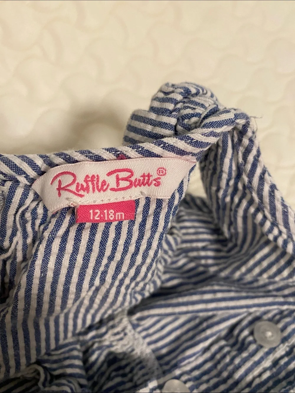 Ruffle Butts Blue & White Striped Ruffle Romper with Pink Bows